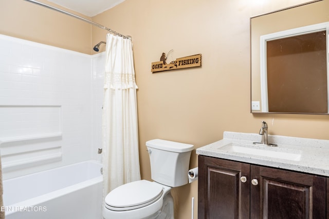 full bathroom with vanity, toilet, and shower / bath combo with shower curtain