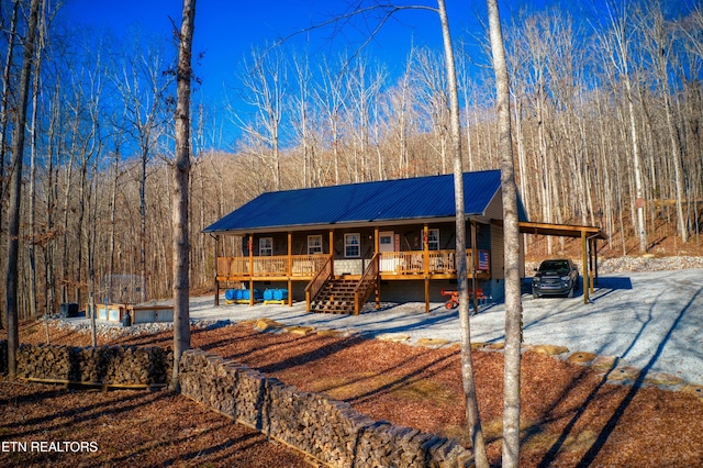 view of front of house with a carport