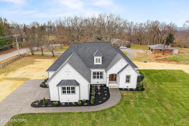 view of front of home featuring a front lawn