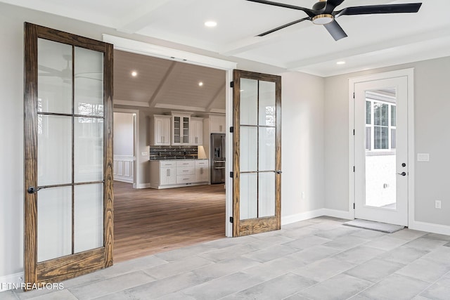 interior space featuring vaulted ceiling with beams, light hardwood / wood-style floors, ceiling fan, and wood ceiling