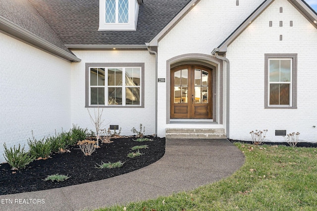 doorway to property featuring french doors