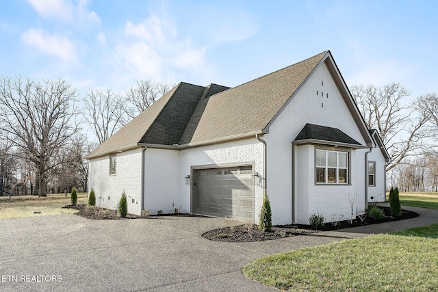 view of home's exterior featuring a garage