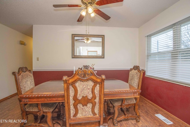 dining room with hardwood / wood-style floors