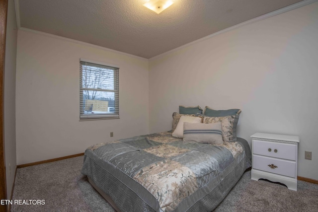 carpeted bedroom with crown molding and a textured ceiling