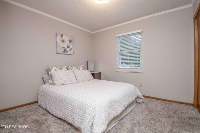 carpeted bedroom featuring crown molding and a textured ceiling