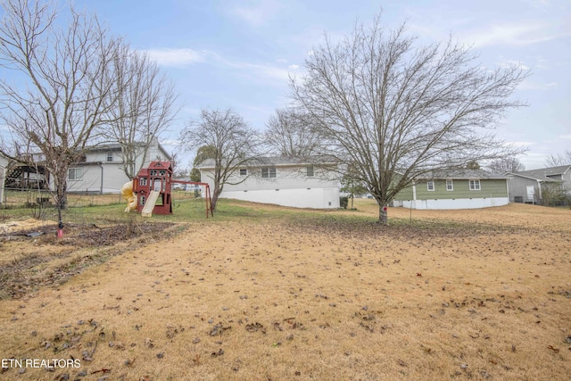 view of yard with a playground