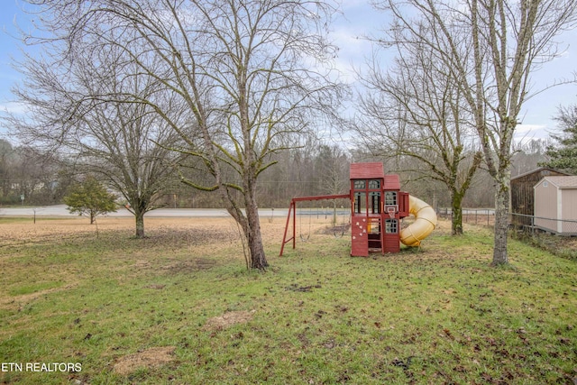 view of yard with a playground