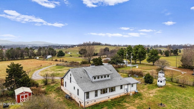 drone / aerial view featuring a mountain view