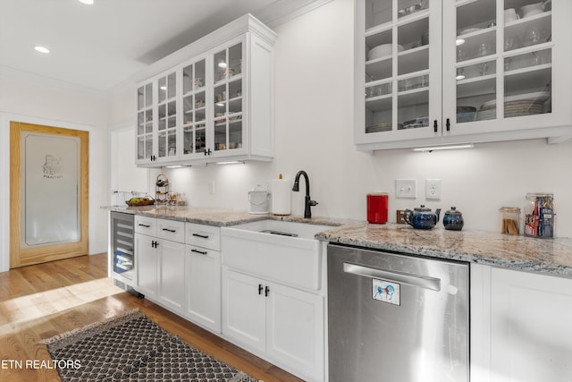 1430 Maple Ln, Greenback, TN 37742 - kitchen featuring stainless steel dishwasher, beverage cooler, crown molding, light wood-style floors, and a sink