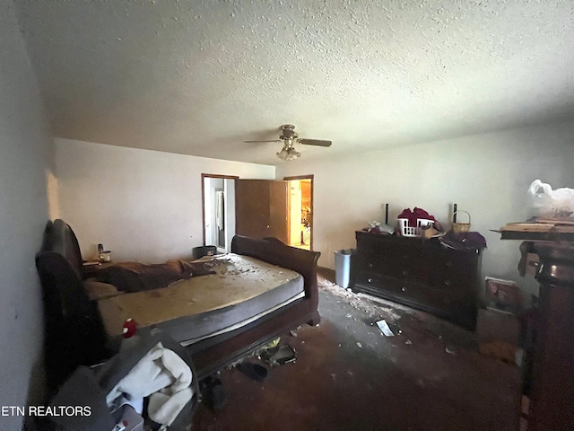 carpeted bedroom with ceiling fan and a textured ceiling