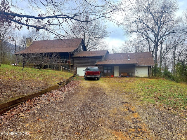 view of front of property featuring a garage