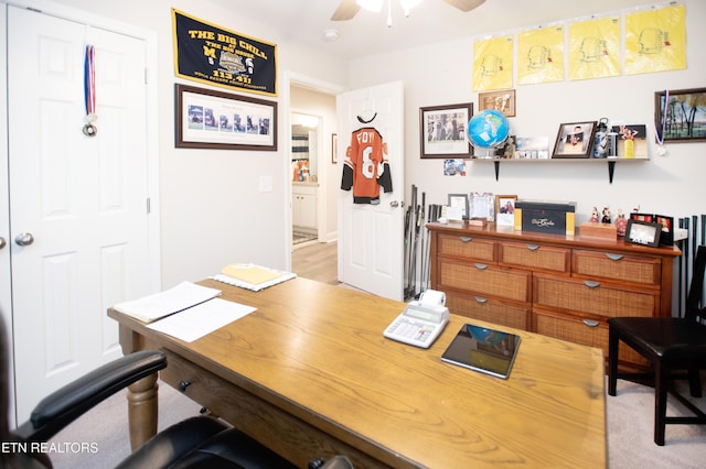 office space with ceiling fan