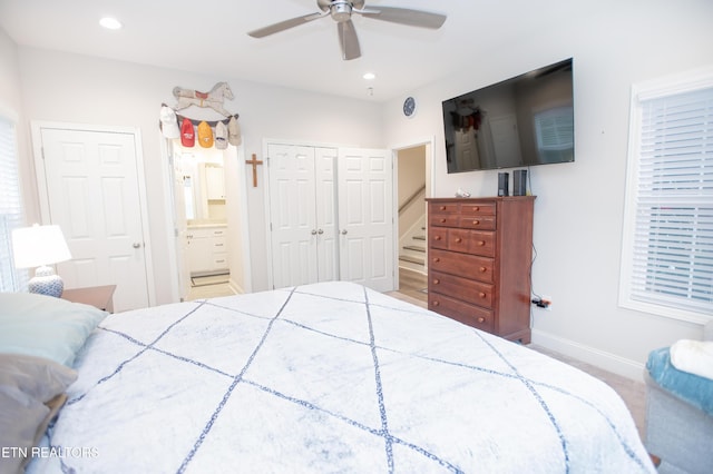 bedroom with connected bathroom and ceiling fan