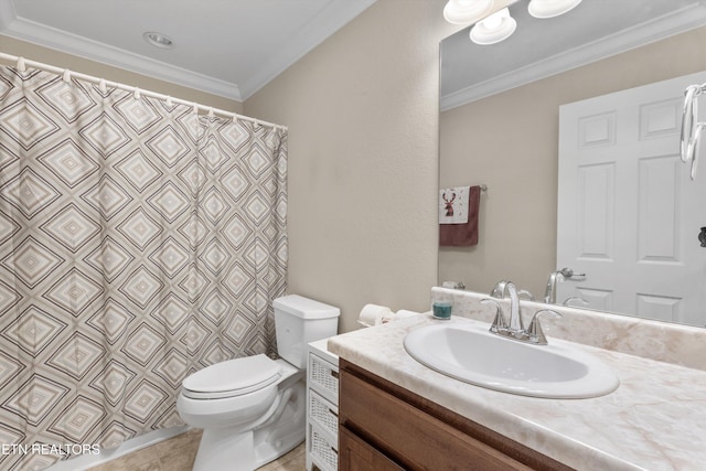 bathroom featuring tile patterned floors, vanity, toilet, and crown molding