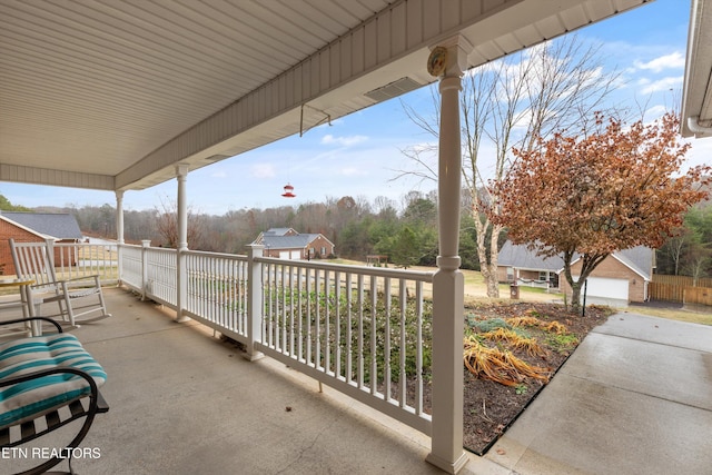 view of patio featuring a porch