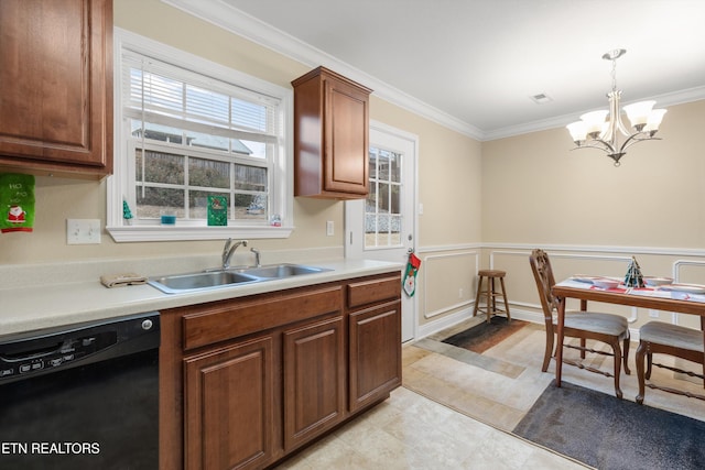 kitchen featuring dishwasher, sink, a notable chandelier, pendant lighting, and ornamental molding