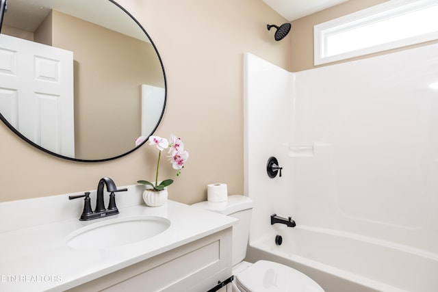 full bathroom with vanity, toilet, and shower / washtub combination