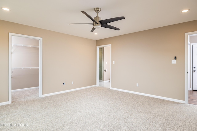 interior space featuring ceiling fan