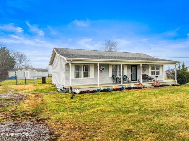 view of front of property featuring a front yard and a porch