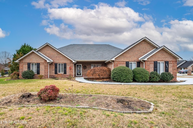 view of front of home with a front yard