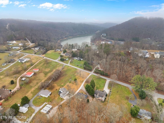 drone / aerial view with a water view