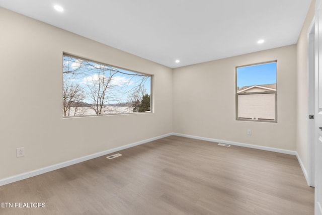 empty room featuring light hardwood / wood-style floors