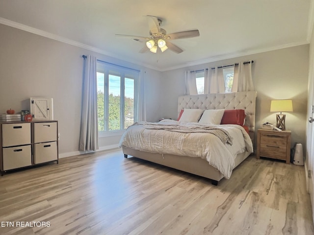 bedroom with multiple windows, crown molding, and light hardwood / wood-style flooring