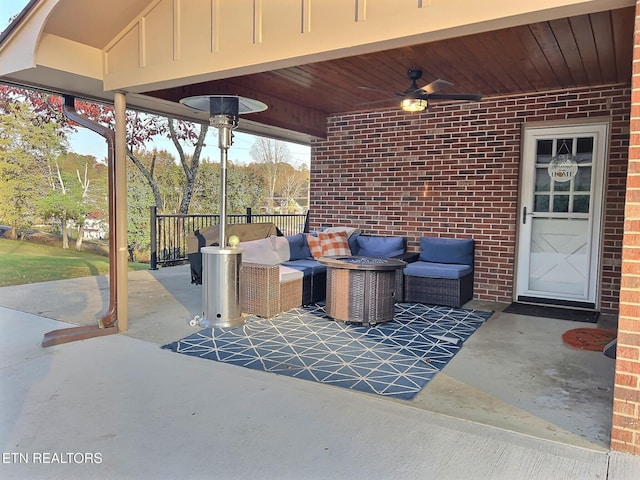 view of patio featuring an outdoor living space and ceiling fan