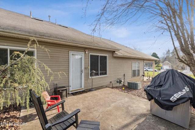 back of property with a patio