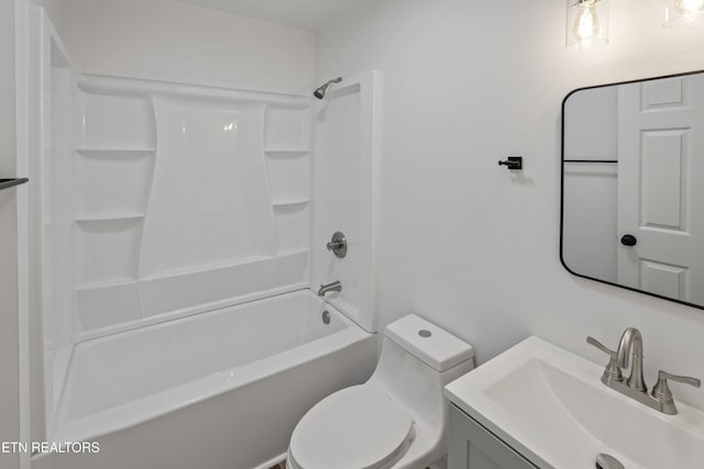 full bathroom with vanity, shower / bath combination, and toilet