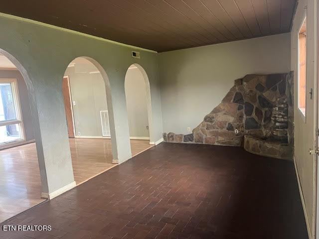 unfurnished room featuring wood ceiling