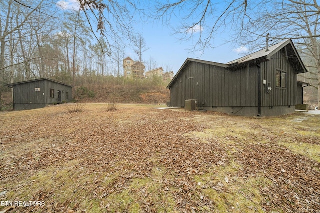 view of yard with central AC