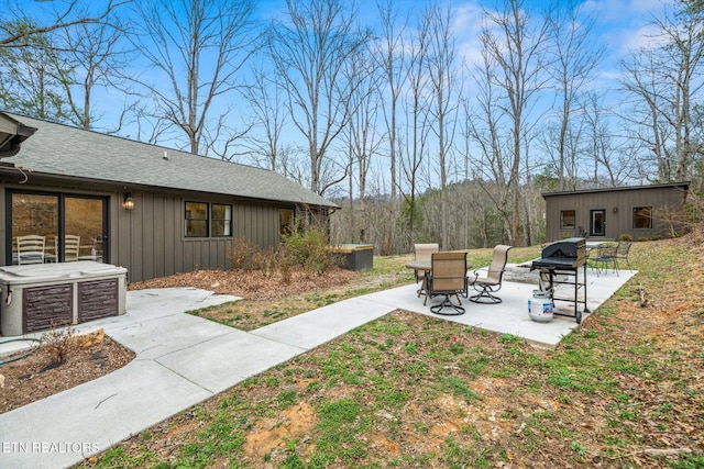 view of yard featuring a patio area, central AC unit, and an outdoor structure