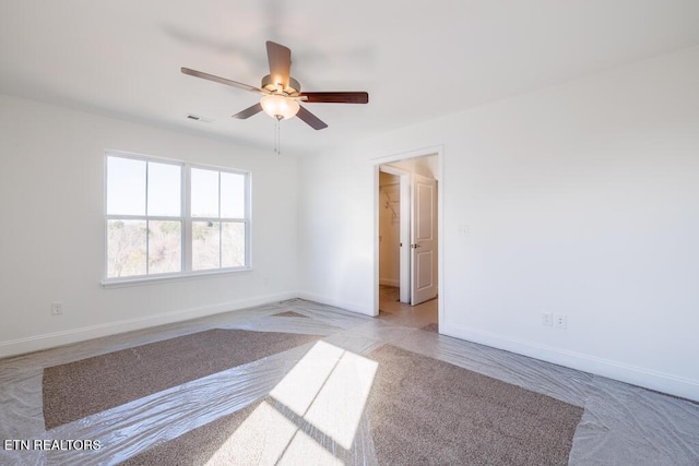 empty room with ceiling fan