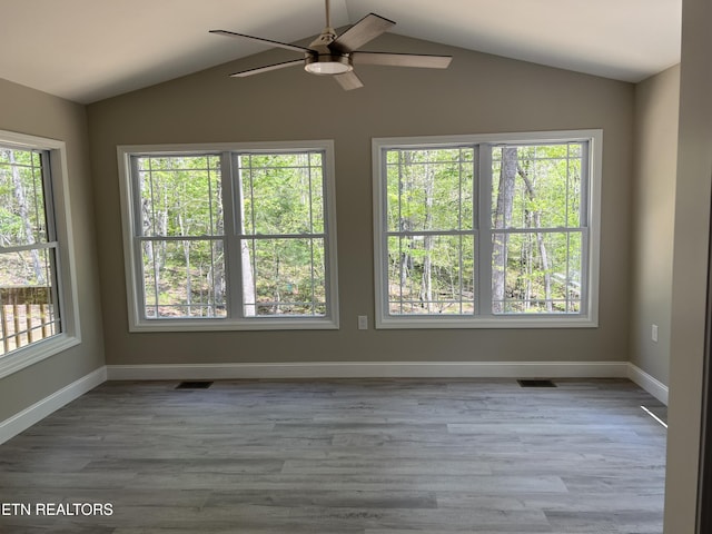 150 Hunterwood Ln, Fairfield Glade, TN 38558 - spare room with lofted ceiling, ceiling fan, plenty of natural light, and visible vents