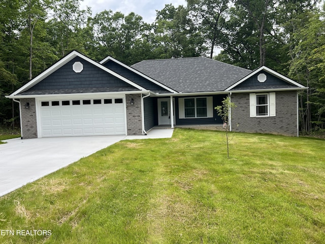 150 Hunterwood Ln, Fairfield Glade, TN 38558 - ranch-style home featuring concrete driveway, an attached garage, brick siding, and a front yard