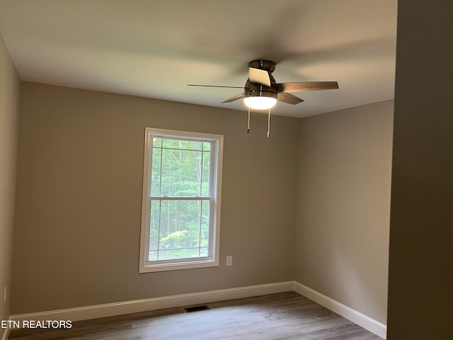150 Hunterwood Ln, Fairfield Glade, TN 38558 - unfurnished room with wood finished floors, ceiling fan, and baseboards
