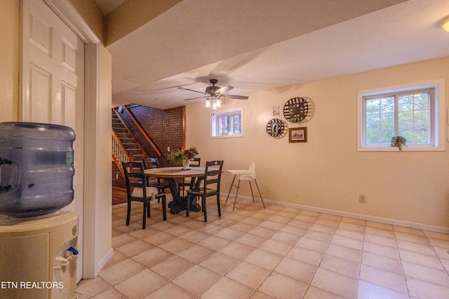 dining room featuring ceiling fan