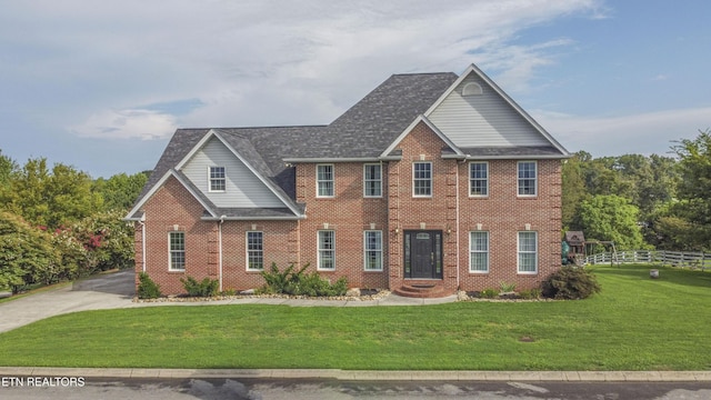 view of front of house with a front lawn