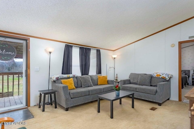 living room featuring light colored carpet, a textured ceiling, and ornamental molding