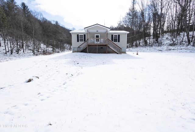 view of front of property with a deck