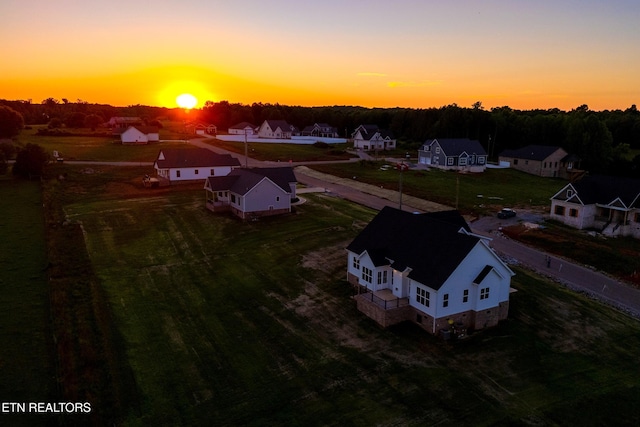 view of aerial view at dusk