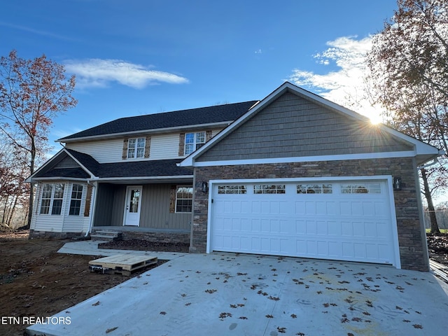 view of front of home with a garage