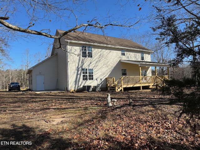 rear view of house with a deck