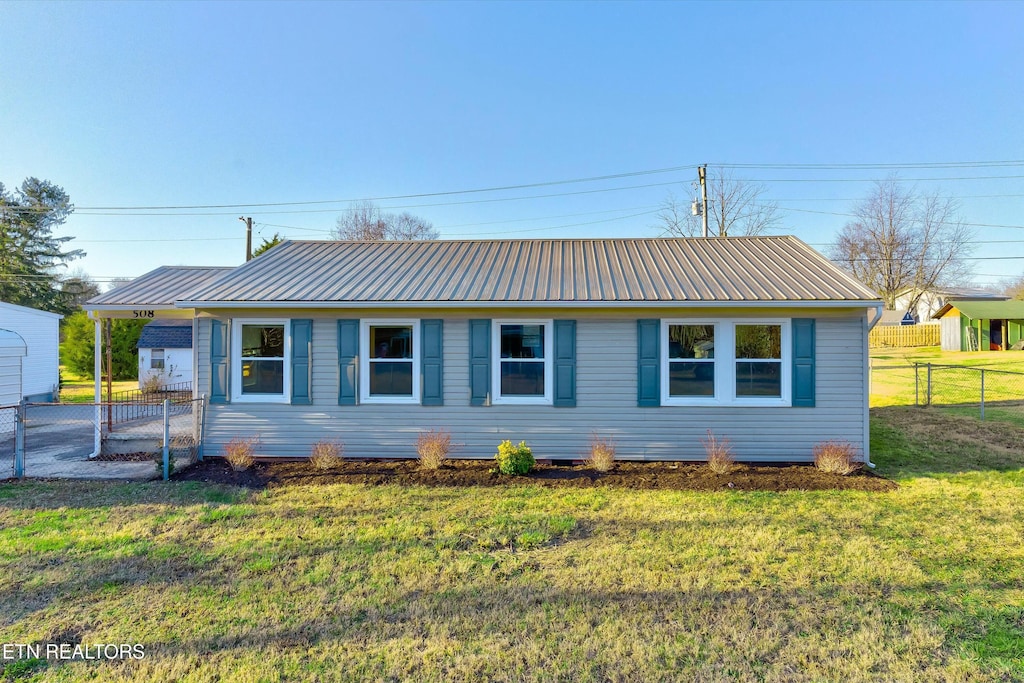 view of front of home with a front yard