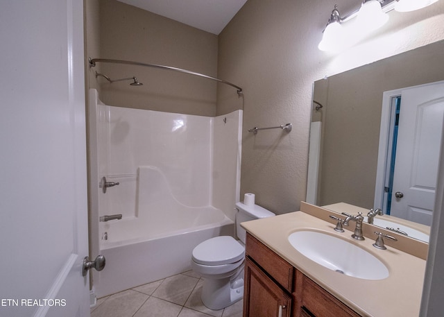 full bathroom with tile patterned floors, toilet, vanity, and tub / shower combination