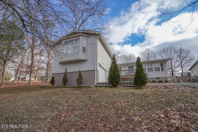 view of home's exterior featuring a garage