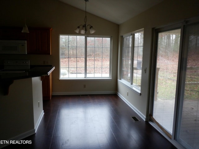 296 Georgee Rd, Jamestown, TN 38556 - unfurnished dining area featuring dark hardwood / wood-style floors, lofted ceiling, and a chandelier