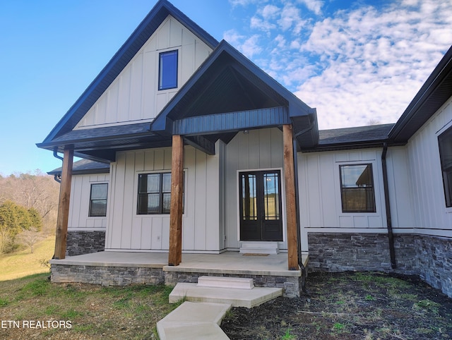 back of house with covered porch