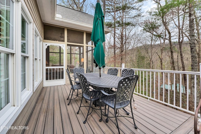 deck featuring a sunroom